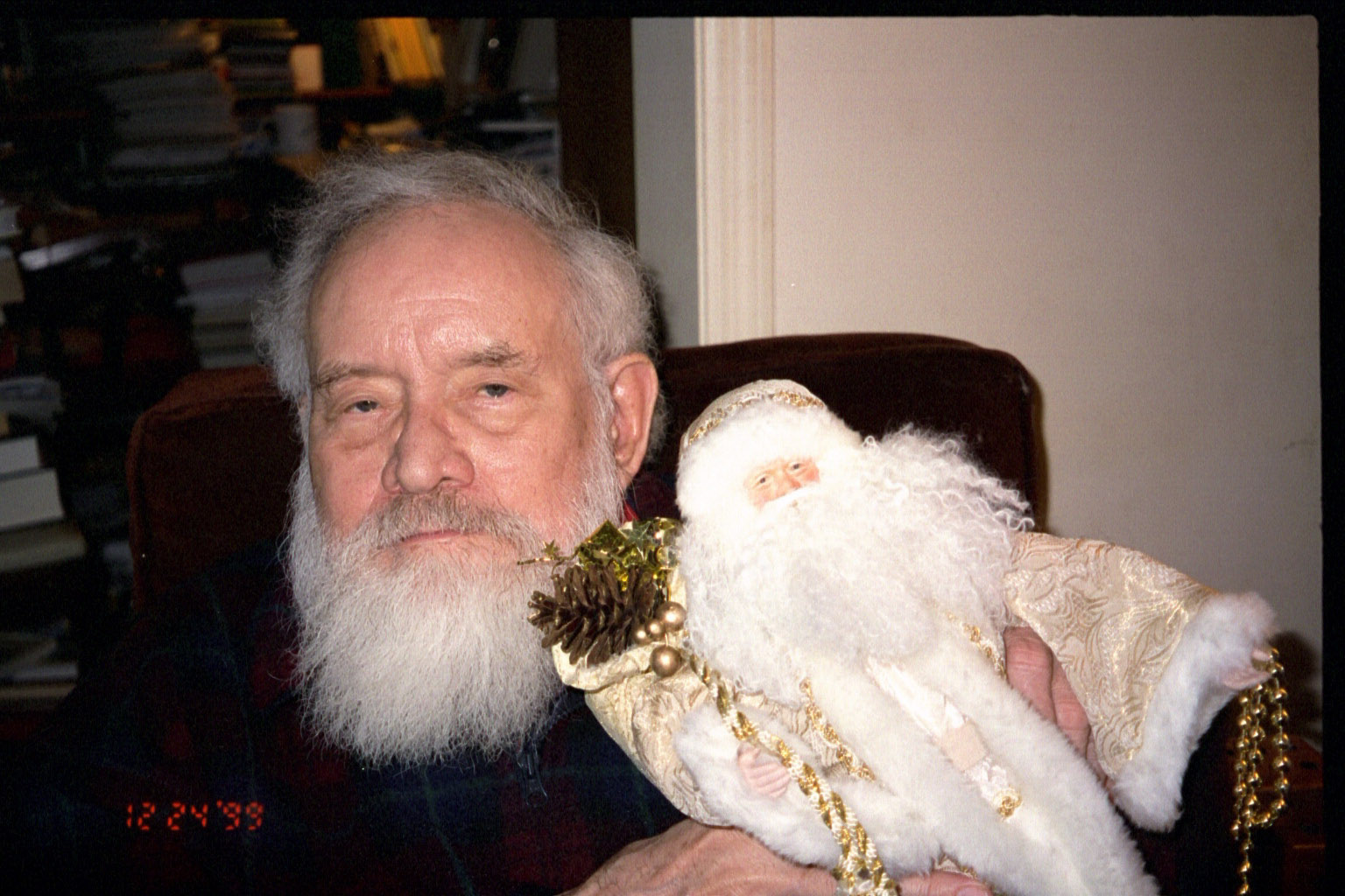 Santa Claus (a.k.a. Daddy) posing with his Santa doll