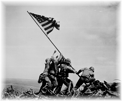 Flag rising over Iwo Jima.