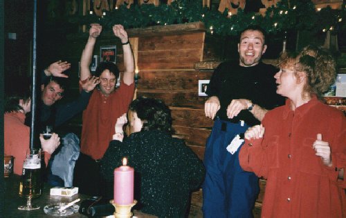 Aidan Barry with his arms up and red eye