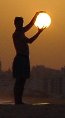 Man holding the sun