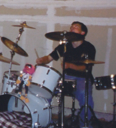 NOOO! The cymbal is cutting his head off!