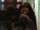 Max comforting a woman