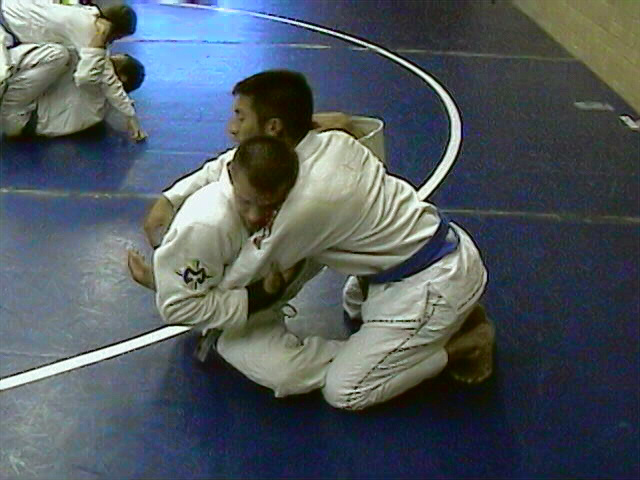 Standard Butterfly Guard Hook Sweep Position