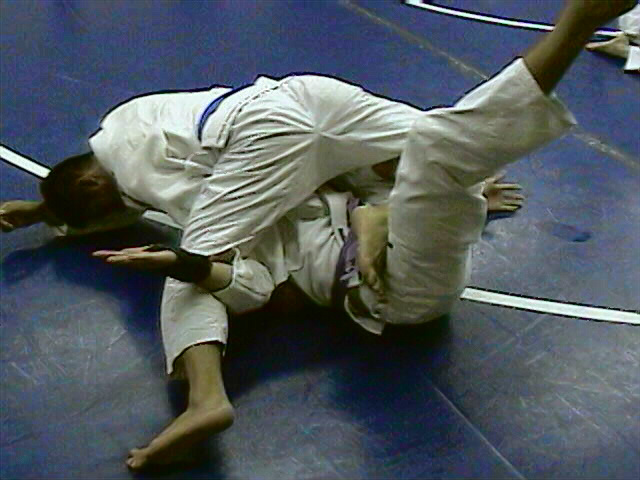 Trapping opponent's lower leg in front of my hip/thigh