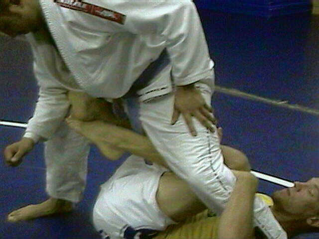 Bend his knee with your knee...