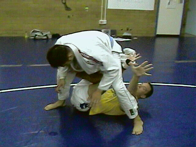 No belt to grab onto, trying to control his ankles...
