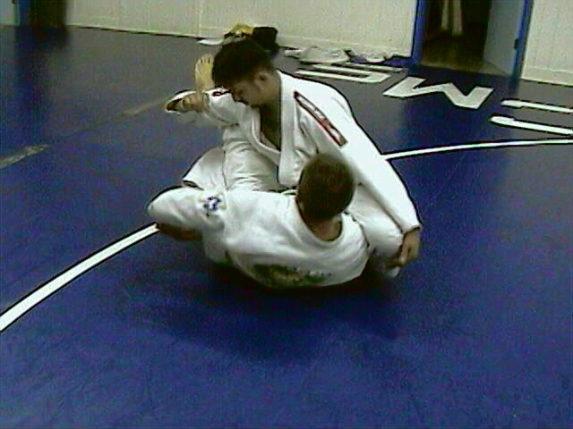 Rock back, then kick with your hamstring and pull with your hand
