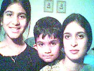 aunt and cousins, Ifrah & Faiz, who send me gifts from distant lands ;-) hee hee meow