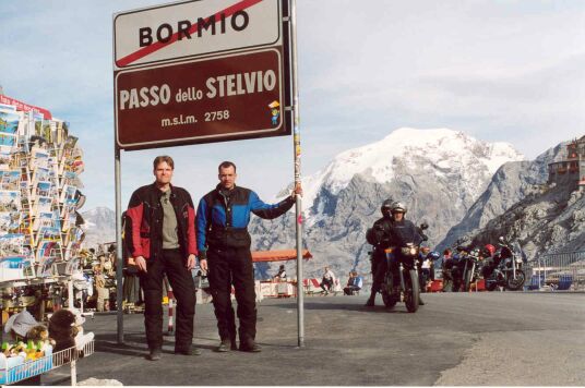 Mark and Leon at the pass sign