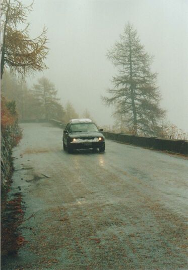 Oh oh...car with snow on it coming down.