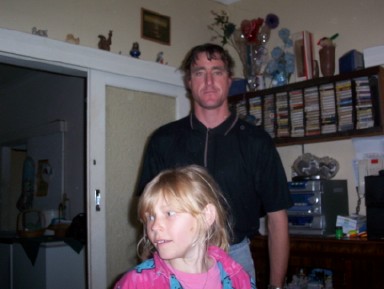 my couzin jodee n me with a beer tan