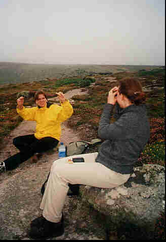 having a chocolate break on the cliff