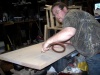Dust removal between sanding media grades.