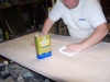 Fine cleaning of dust from the sign blank surface.