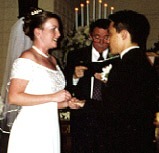 With this ring I thee wed.