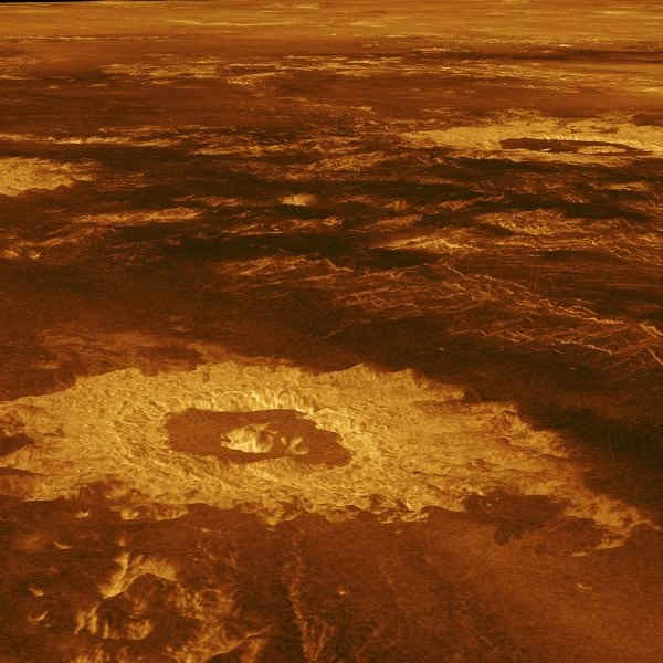 Three impact craters are displayed in this three-dimensional perspective view of the surface of Venus. The center of the image is located at approximately 27 degrees south latitude, 339 degrees east longitude in the northwestern portion of Lavinia Planitia.
