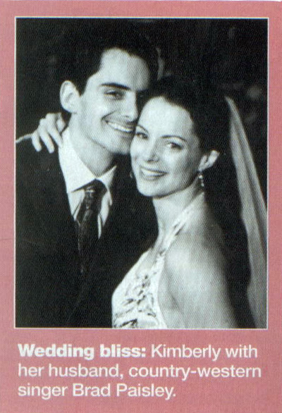 Really cute wedding picture of Kim and Brad