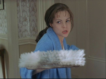 Virginia defends herself with broom.