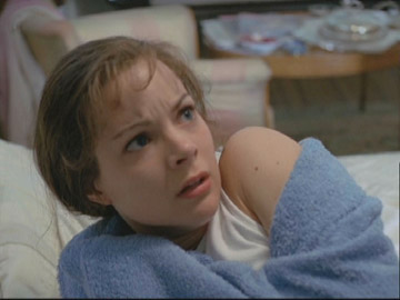 Virginia cringes from Wolf's attack.
