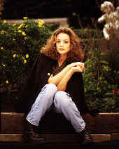 Kim sitting on the porch steps