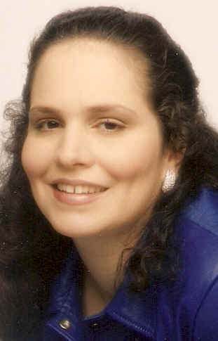 A professionally made picture of my wife ... in the happier days, before she became ill with cancer. (miracl2.jpg, 12 KB)