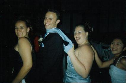 Our prom king surrounded by lovely ladies