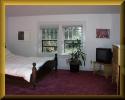 The master bedroom offers a shaded view of the backyard.  Click to see a larger image.