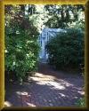Discover the hot tub, secluded in the garden.  Click to see a larger image.