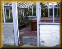 The hot tub is enclosed by the old greenhouse.  Click to see a larger image.