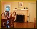 The dining room fireplace will warm you at mealtimes.  Click to see a larger image.