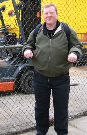 Kevin in front of work site
