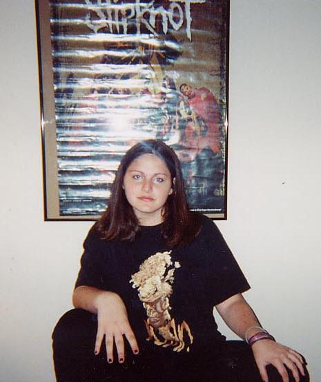 Fyre tryin' to look all cool in front of her slipknot poster...&nbsp; lol