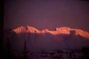 Sun on snow mountains