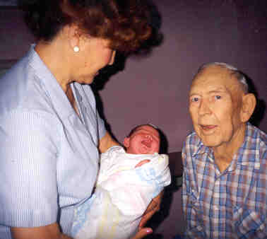 mom,dad, baby brenna