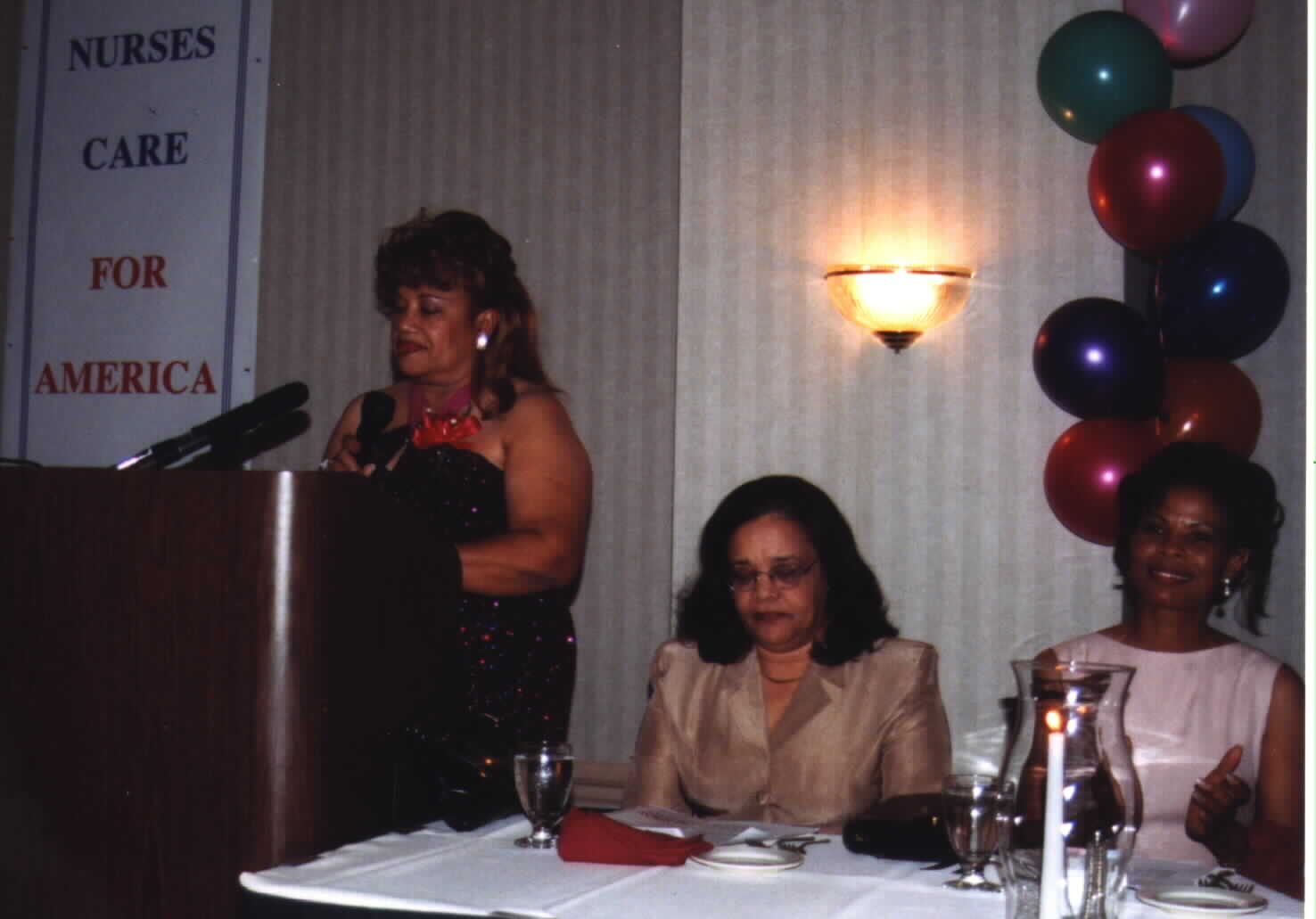 L-R: HANA PRESIDENT Marie Liliane French, MC Solange Benedict and Keynote Speaker Yolly Roberson RN/Esquire