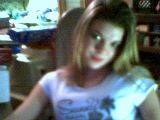 Me..I hate this pic..I look like..a slut..lol..I hate it!!