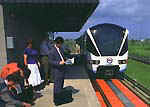 A Bombardier Transportation ART MK 2-vehicle alongside a station platform of the Kuala Lumpur Metro.