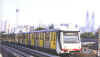 A Star trainset running along an elevated section of the Kuala Lumpur metro network.