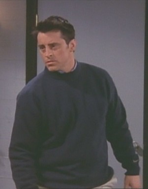 Joey had a fight with Ross, and now looks mad at him when he walkes into the room 