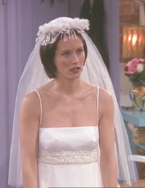 Monica in Emily's wedding dress