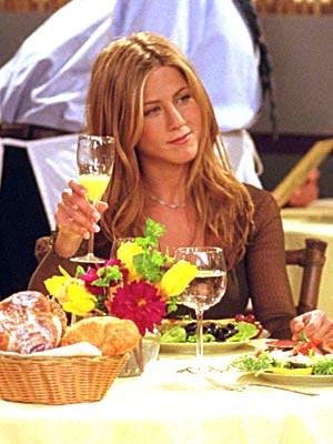 Rachel making a toast to the wedding of Monica and Chandler, at brunch with Phoebe and Monica