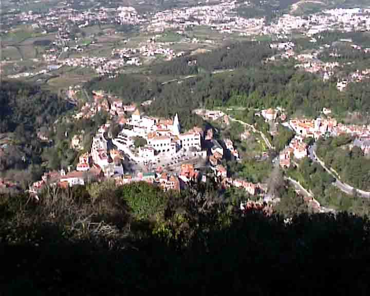From the top of the moorish castle, we can see Sintra palace with 2 big chimneys, 900 feet (300 meters) below.
