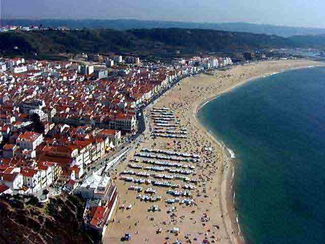 Nazare is one of the most picturesque beaches in Portugal, where traditional features are kept.
