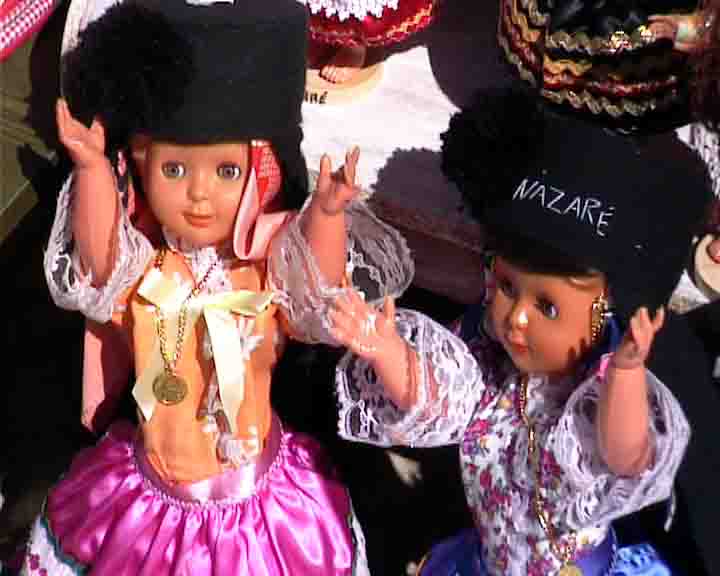 Nazare tours - If you buy one of these dolls, you'll see that they also have seven skirts, like women of Nazare.