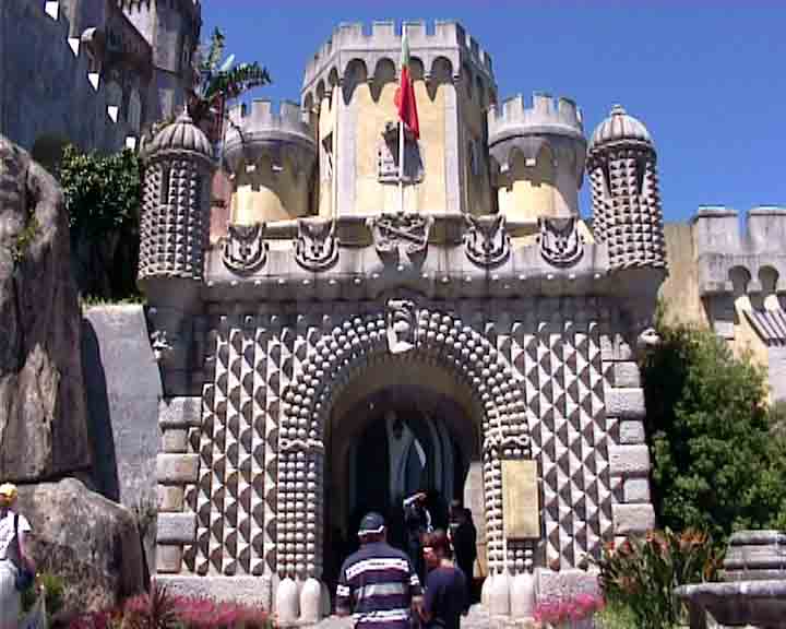 Pena palace entrance with pointed stones, like a palace in Lisbon, leads to a tunnel which takes people to the main entrance.