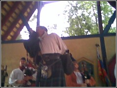 Adrian performs a Scotsman Striptease