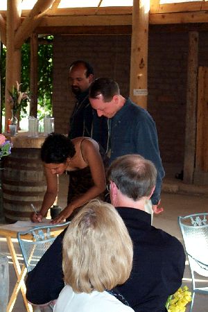 46Signing2.jpg, 31711 bytes, 5/28/02