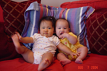 Baby K and Kelly on the sofa