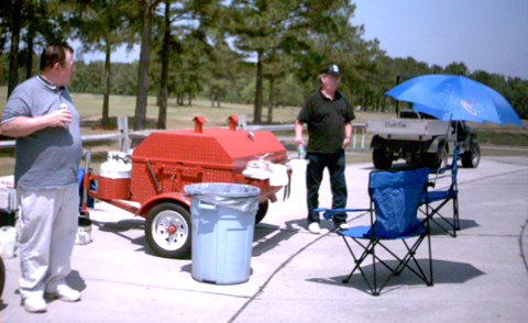 FIL Bill cooking the pig