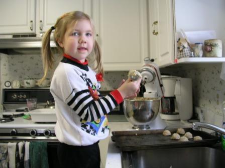 Bethan bakes Oatmeal Scotchies for Daddy